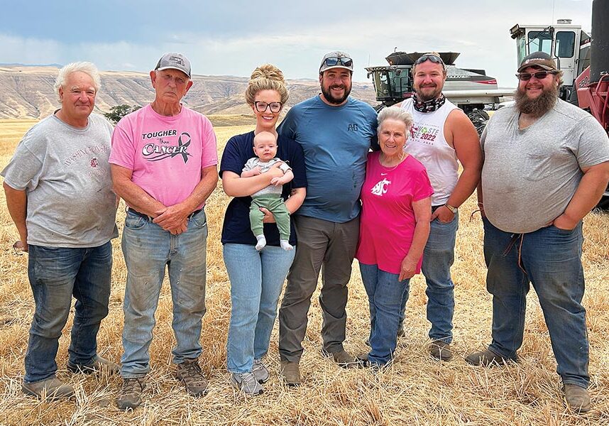 Harvest 2025 on the Koller farm included (from left) Randy Koller, Tim Burt, Colleen Koller holding Weston Koller, Wyatt Koller, Diane Koller, Jesse Koller, and Jordan Koller.